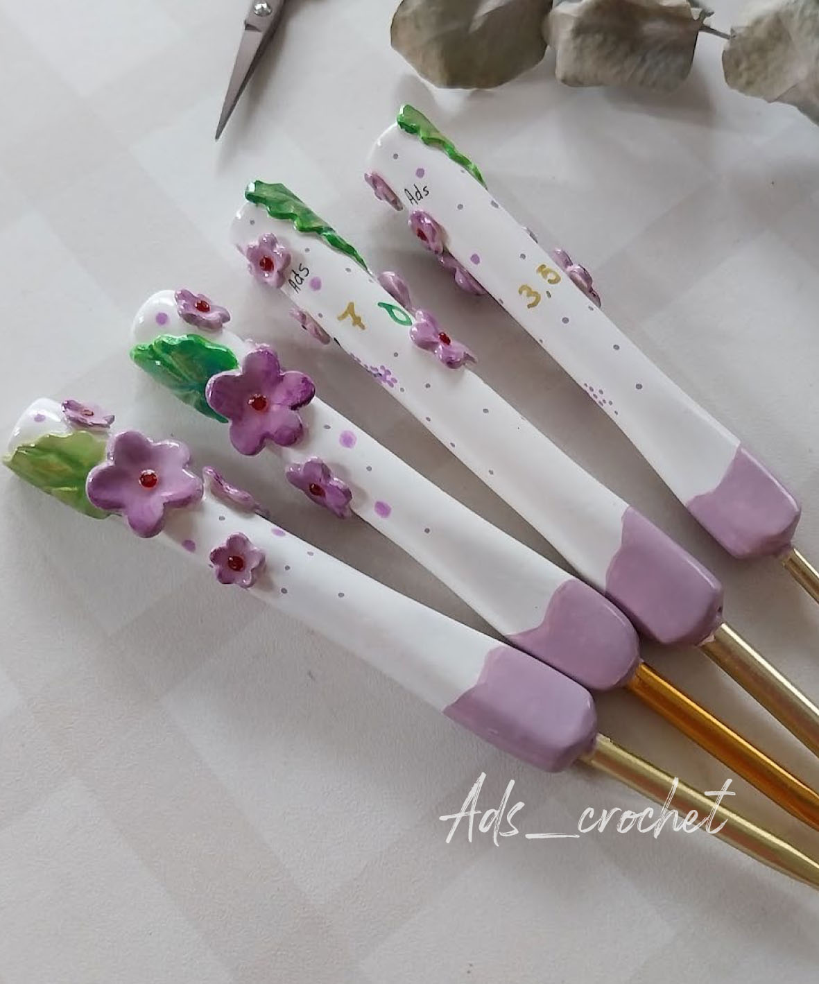 Agujitas artesanales FLORECER "Lilas"